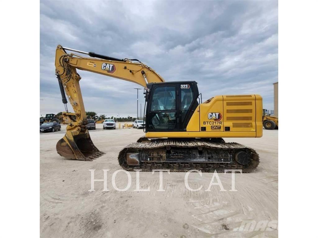 CAT 323 TC Vikšriniai ekskavatoriai