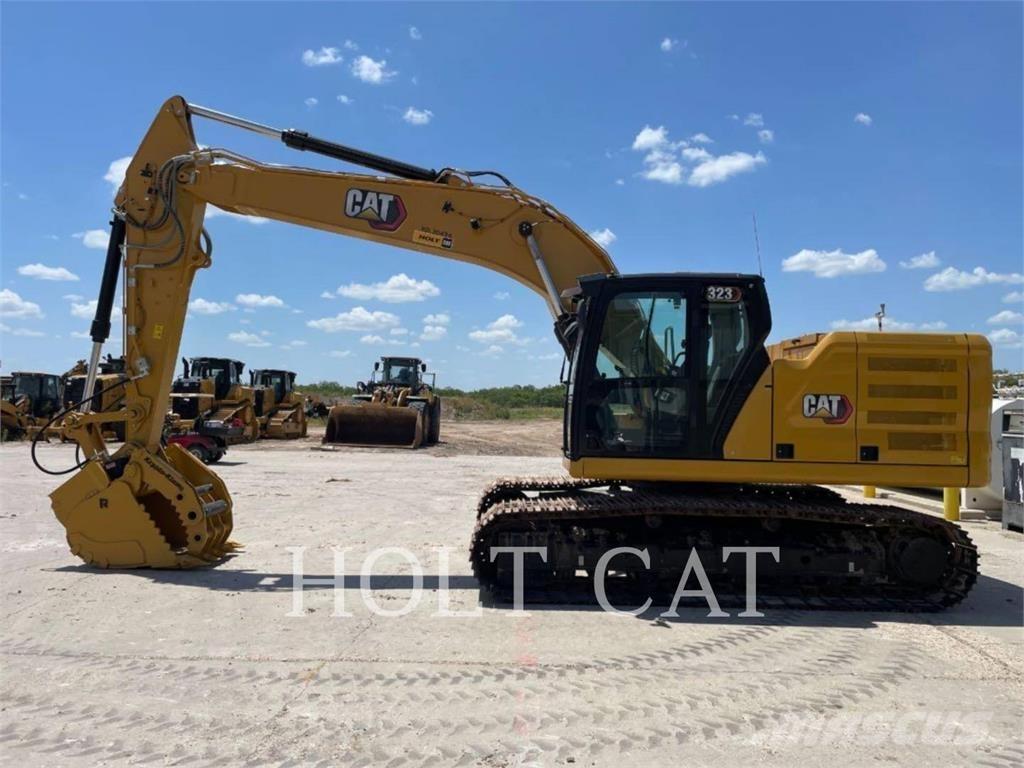 CAT 323 TC Vikšriniai ekskavatoriai