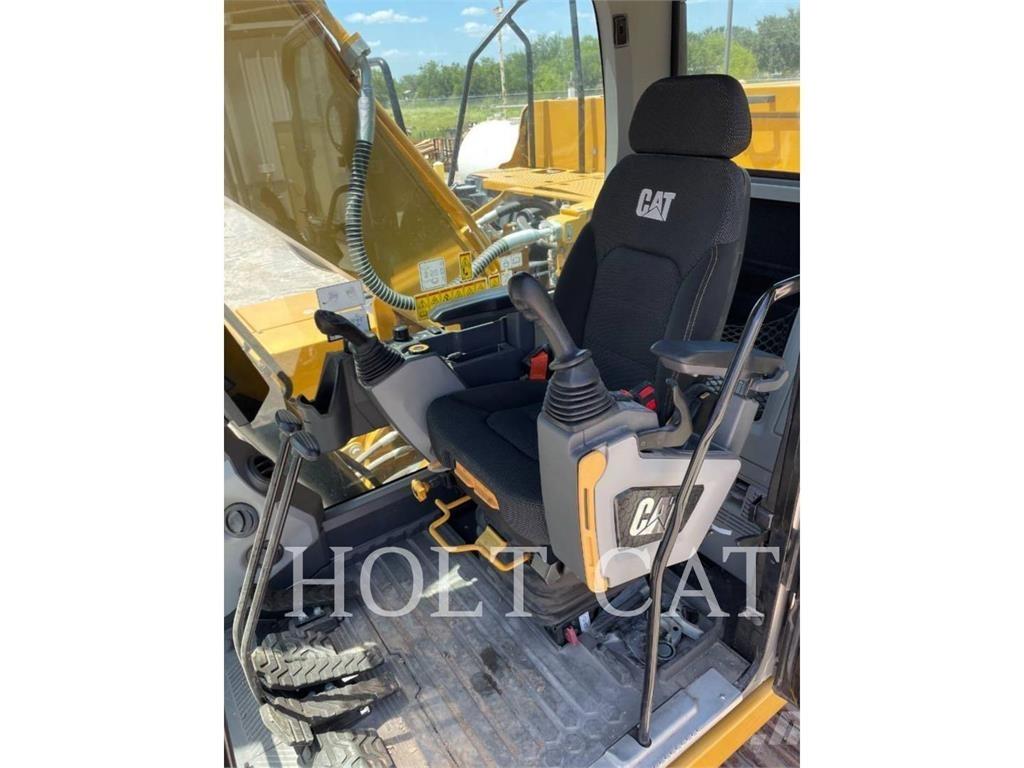 CAT 323 TC Vikšriniai ekskavatoriai