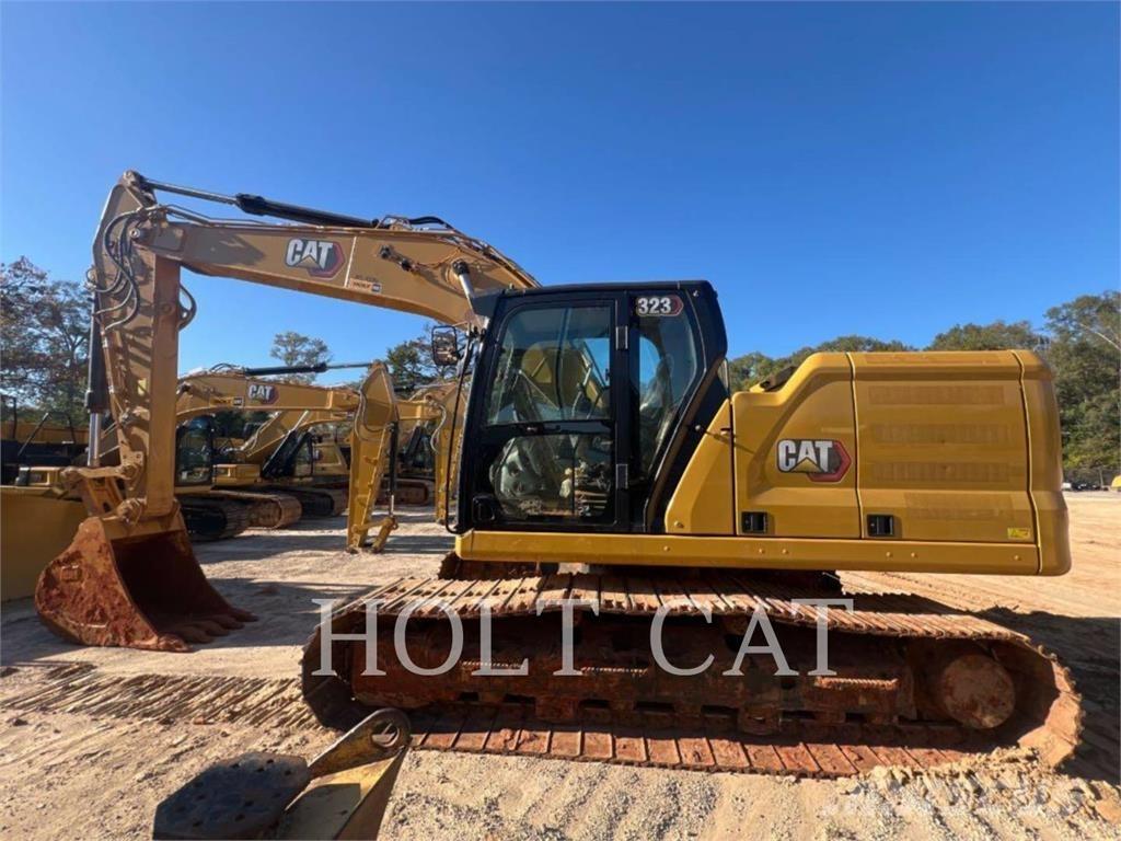 CAT 323 TC Vikšriniai ekskavatoriai