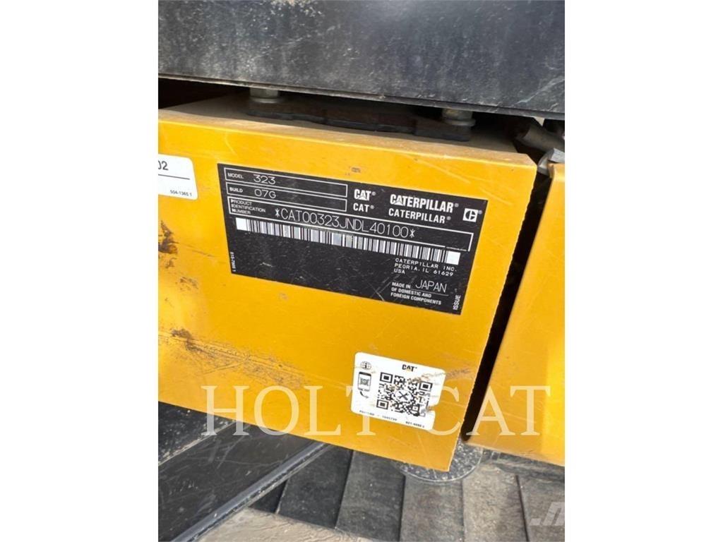 CAT 323 TC Vikšriniai ekskavatoriai