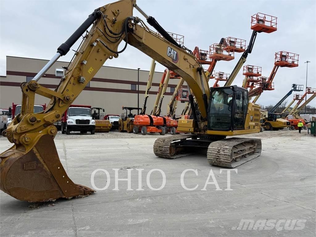 CAT 323 TCS Vikšriniai ekskavatoriai