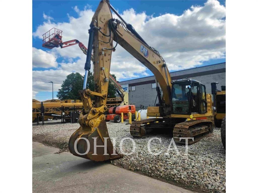 CAT 323 TCS Vikšriniai ekskavatoriai