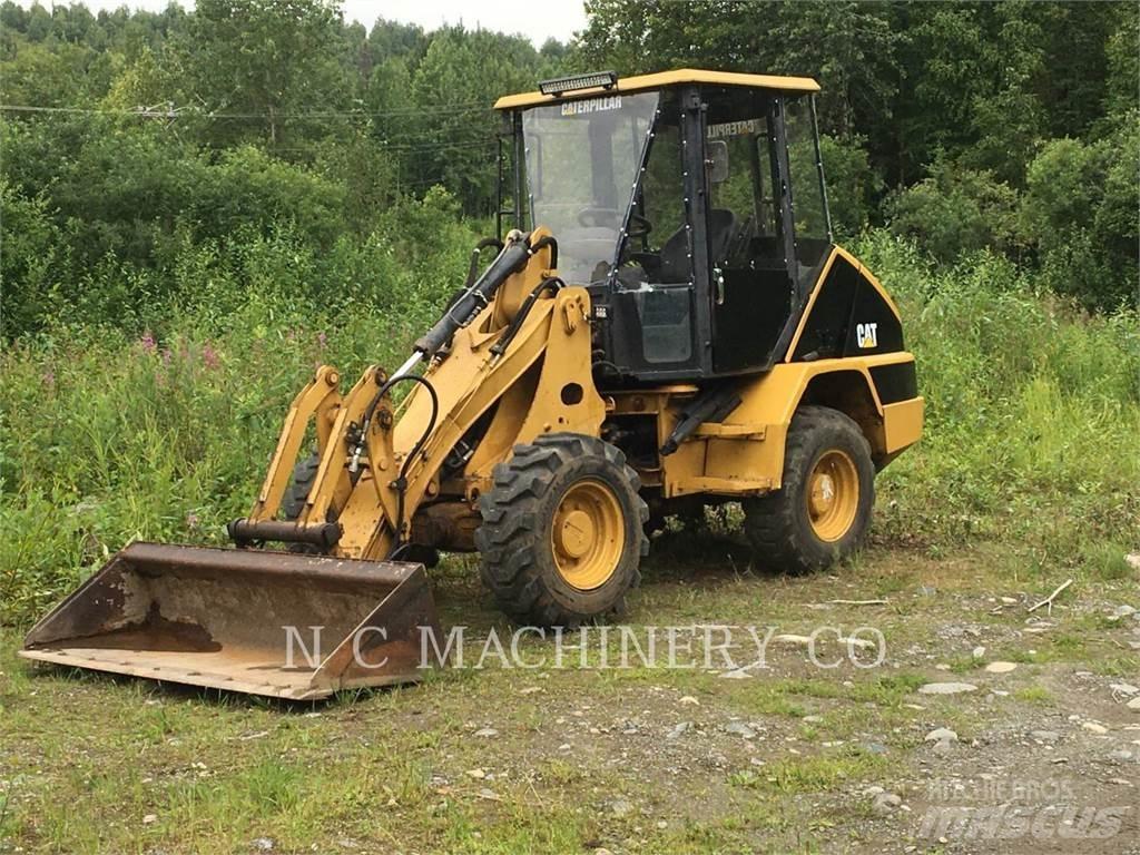 CAT 902 Naudoti ratiniai krautuvai
