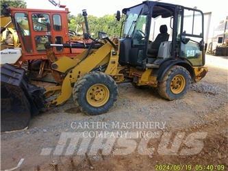 CAT 906M Naudoti ratiniai krautuvai