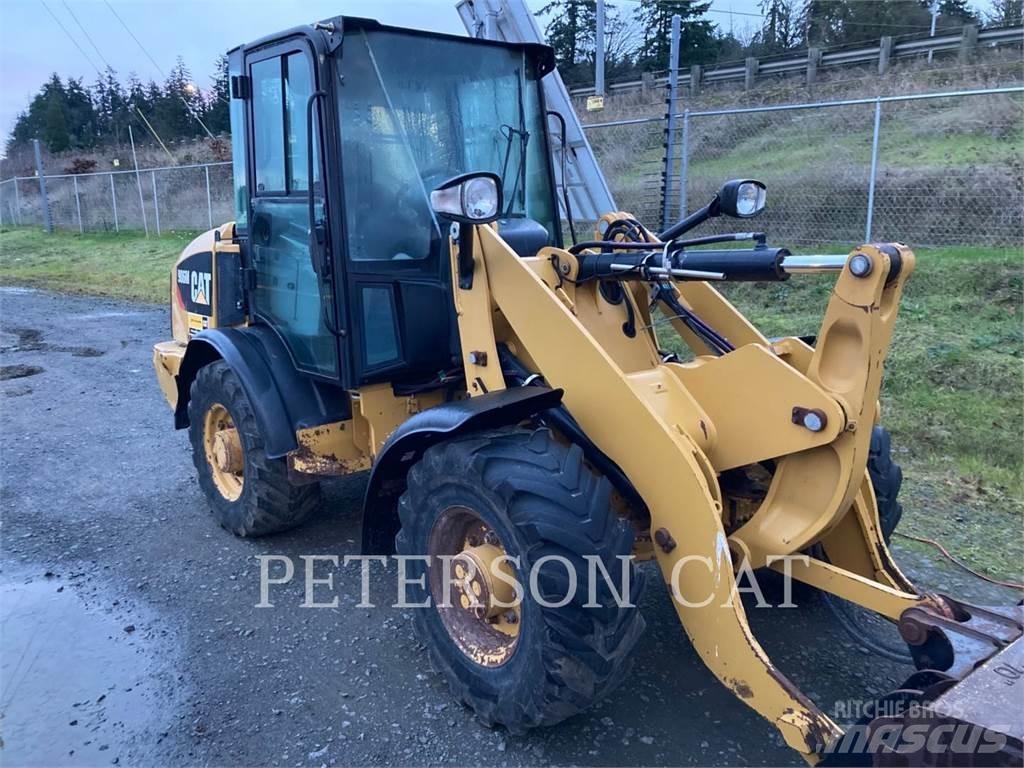 CAT 906M Naudoti ratiniai krautuvai