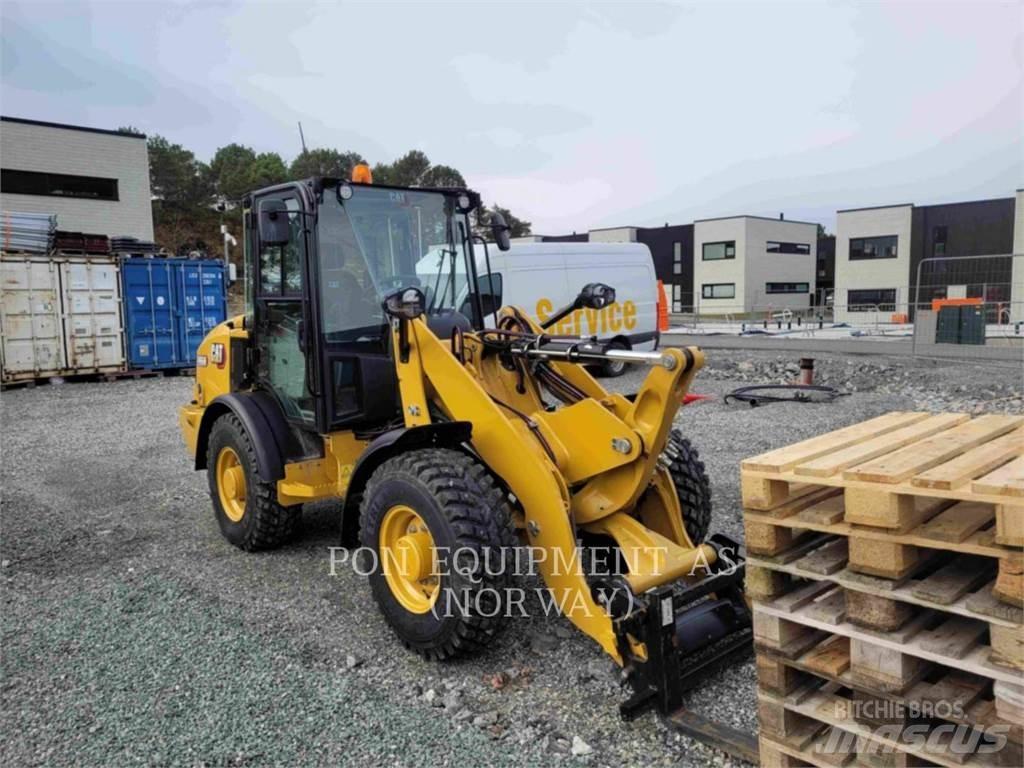 CAT 906M Naudoti ratiniai krautuvai
