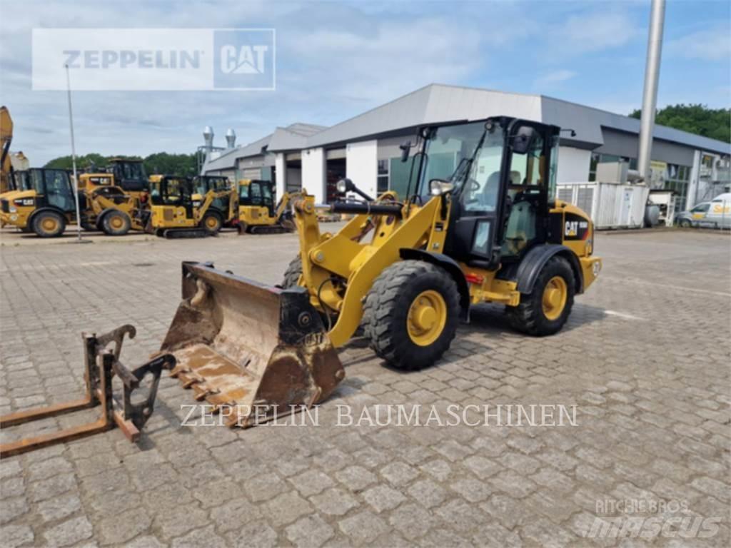 CAT 906M Naudoti ratiniai krautuvai