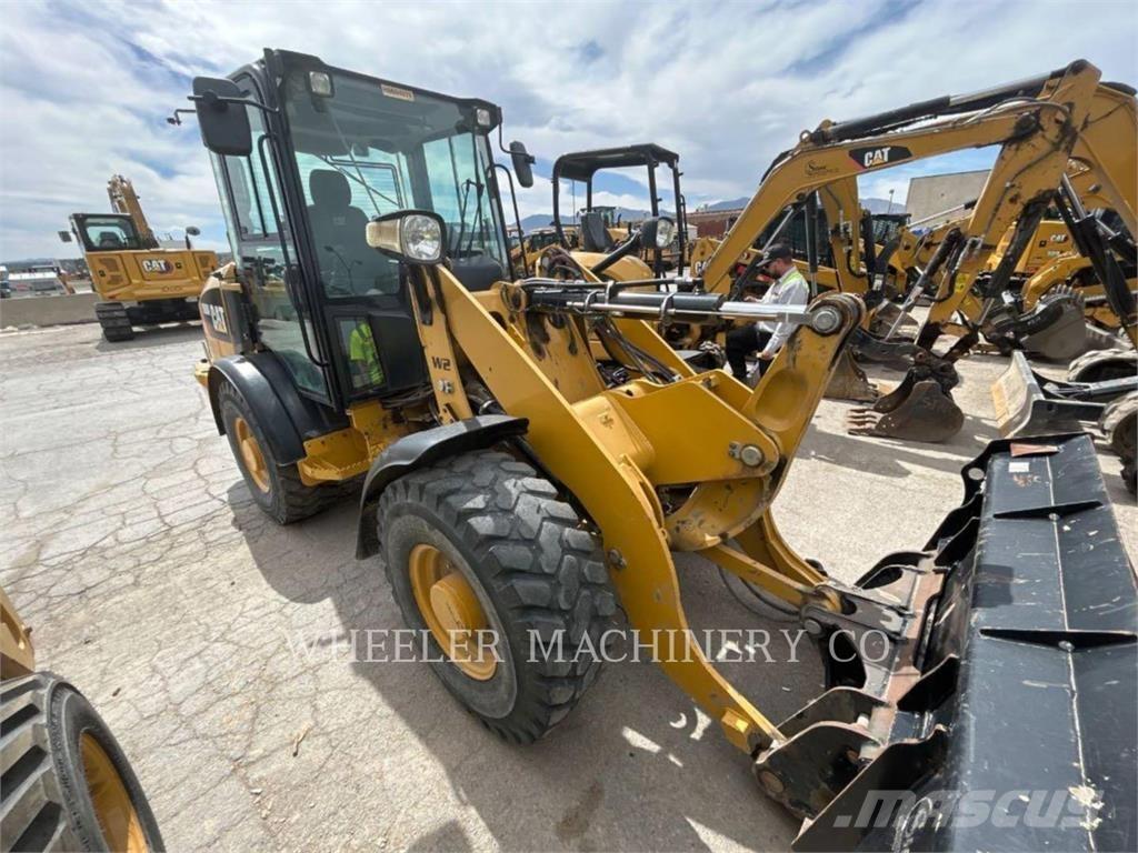 CAT 906M Naudoti ratiniai krautuvai
