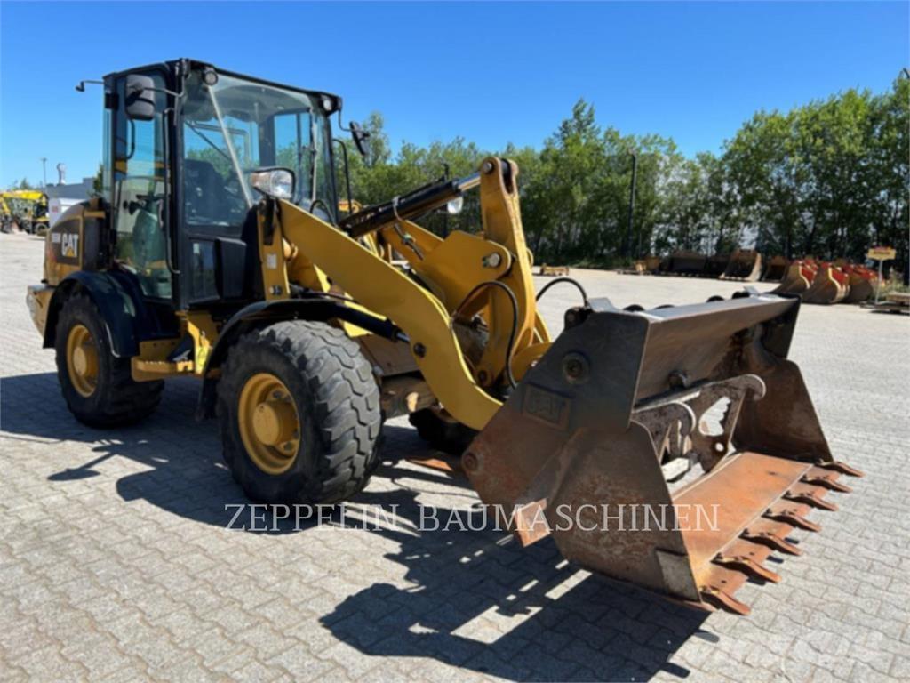CAT 906M Naudoti ratiniai krautuvai