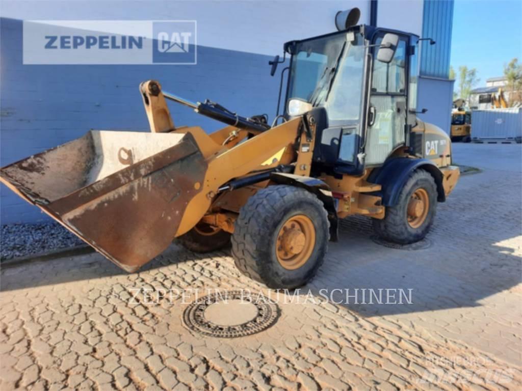 CAT 907H Naudoti ratiniai krautuvai