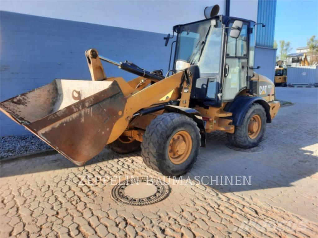 CAT 907H Naudoti ratiniai krautuvai