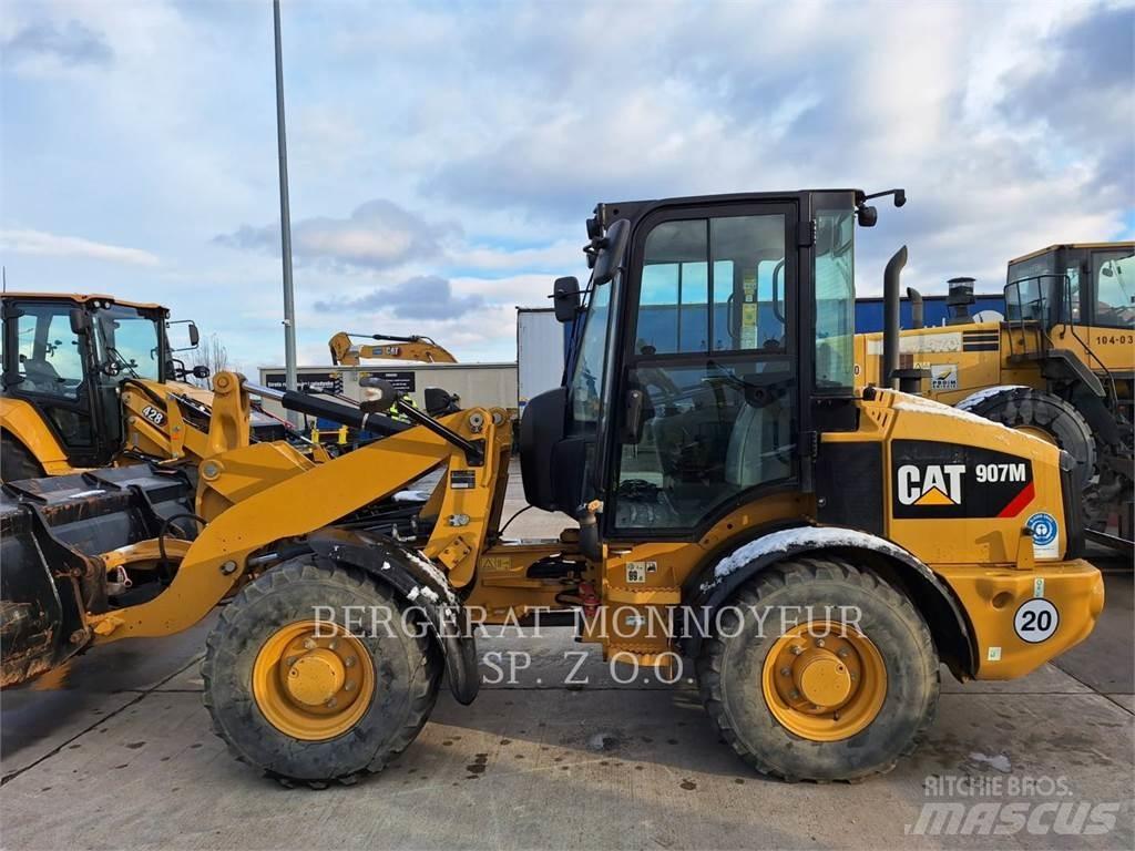 CAT 907M Naudoti ratiniai krautuvai