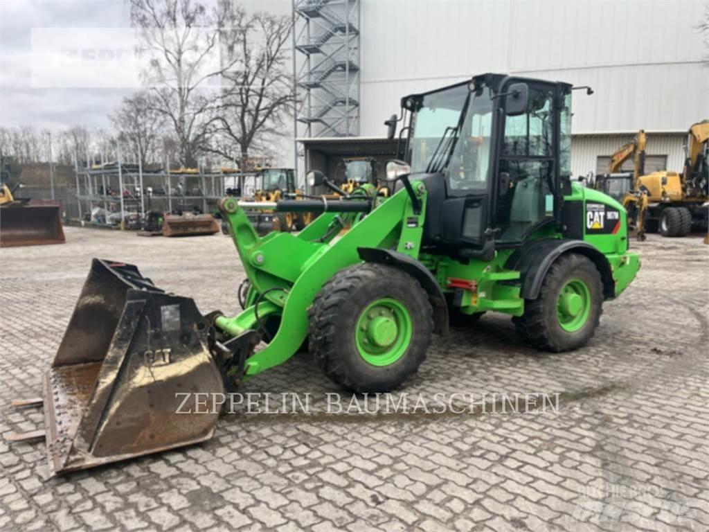 CAT 907M Naudoti ratiniai krautuvai
