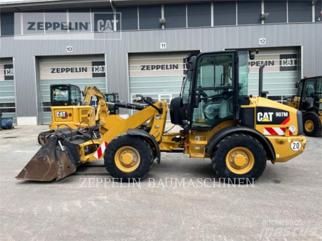 CAT 907M Naudoti ratiniai krautuvai