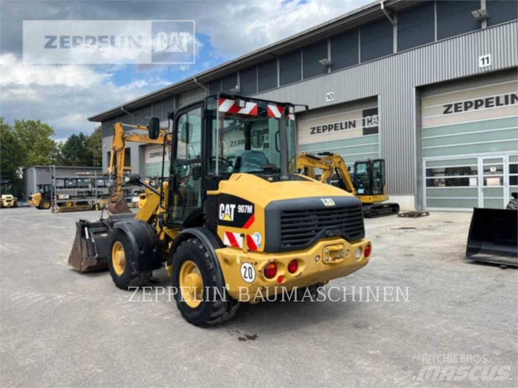 CAT 907M Naudoti ratiniai krautuvai