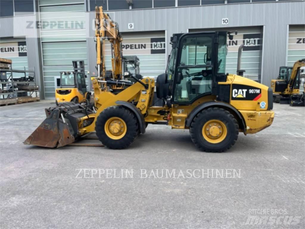 CAT 907M Naudoti ratiniai krautuvai