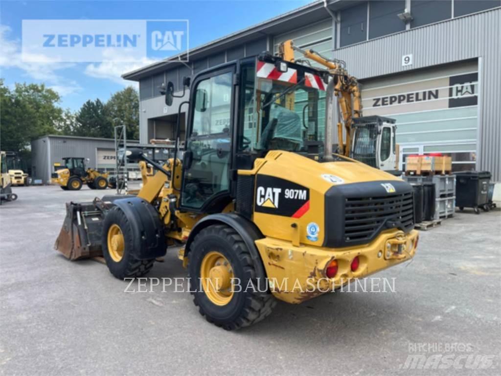 CAT 907M Naudoti ratiniai krautuvai