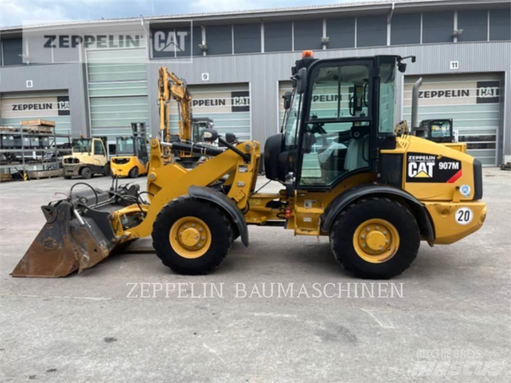 CAT 907M Naudoti ratiniai krautuvai