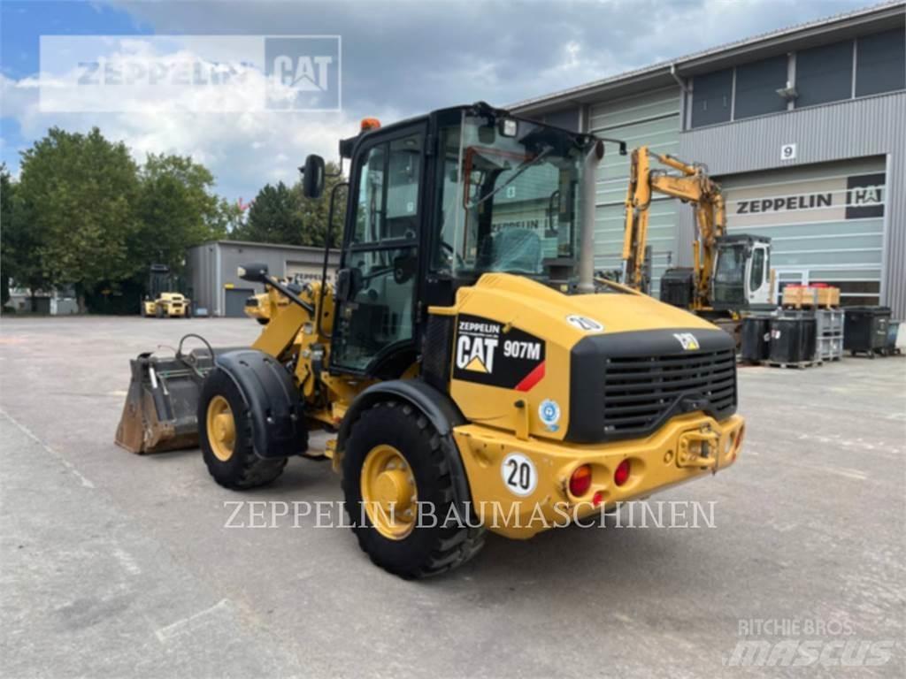 CAT 907M Naudoti ratiniai krautuvai