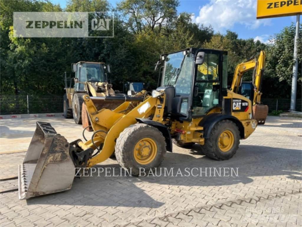 CAT 907M Naudoti ratiniai krautuvai