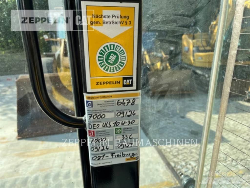 CAT 907M Naudoti ratiniai krautuvai