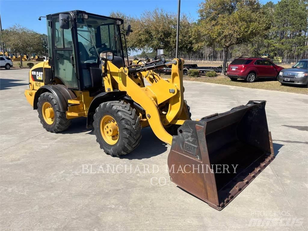 CAT 907M Naudoti ratiniai krautuvai