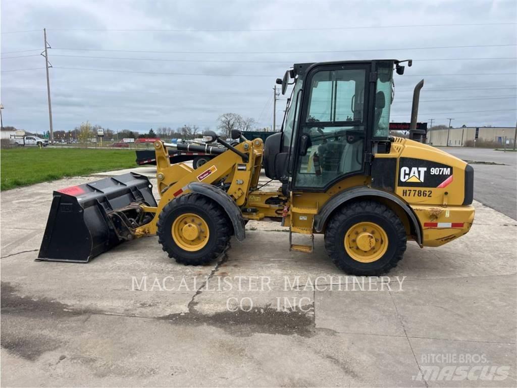 CAT 907M Naudoti ratiniai krautuvai