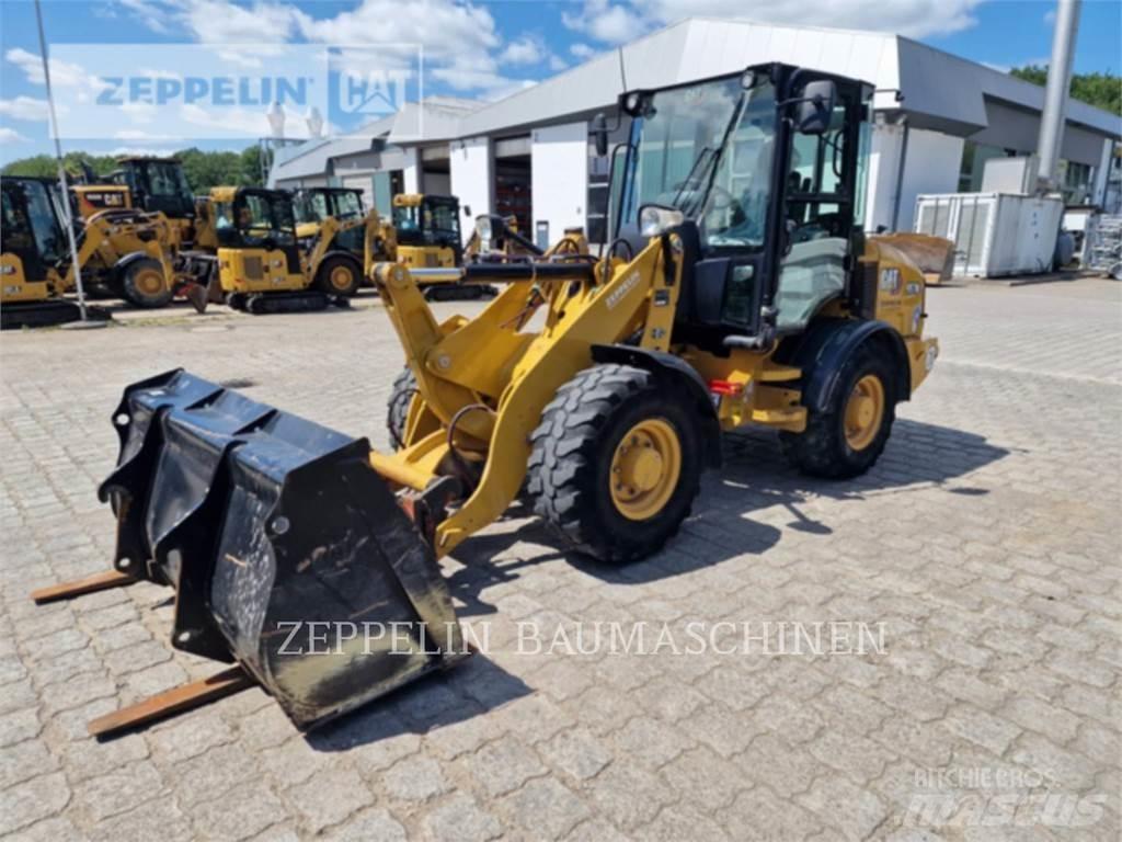 CAT 907M Naudoti ratiniai krautuvai
