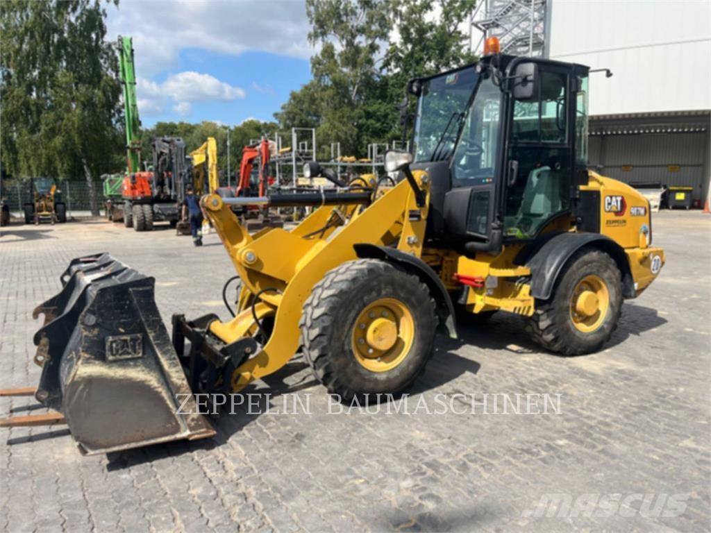 CAT 907M Naudoti ratiniai krautuvai
