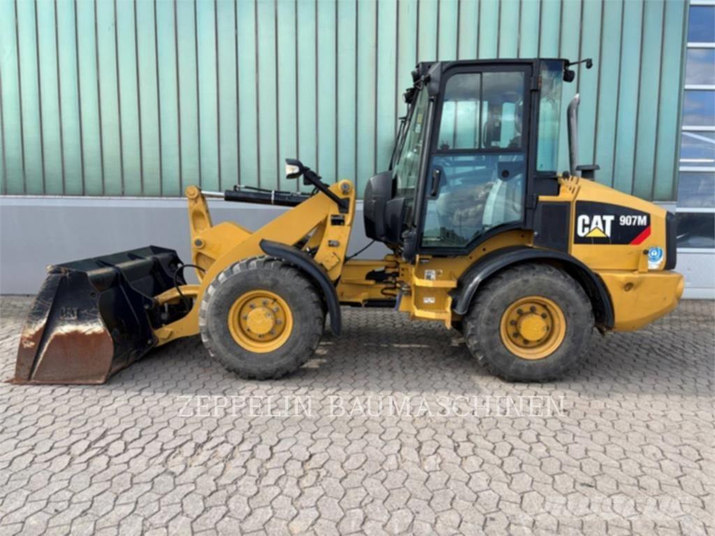 CAT 907M Naudoti ratiniai krautuvai