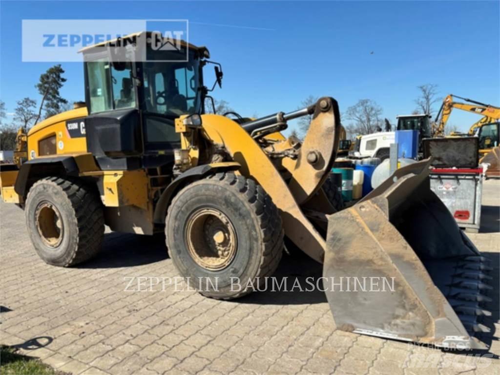 CAT 938M Naudoti ratiniai krautuvai