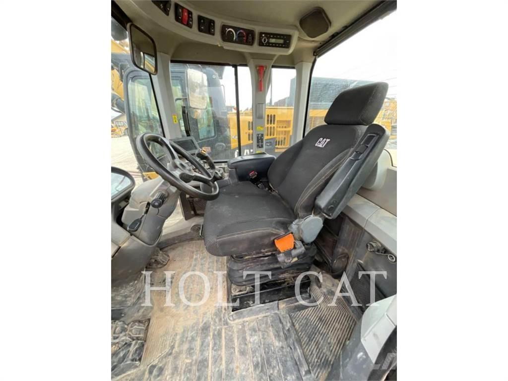 CAT 938M QC Naudoti ratiniai krautuvai