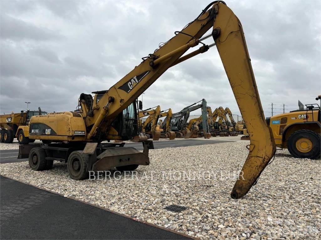 CAT M318C Ratiniai ekskavatoriai