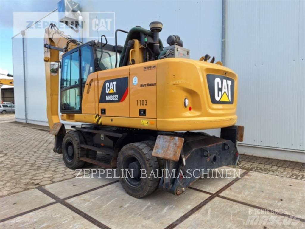 CAT MH3022 Griovimo ekskavatoriai