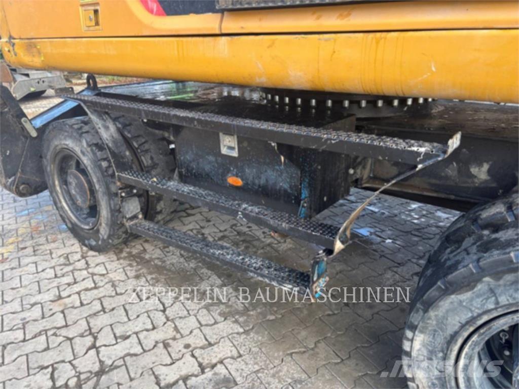 CAT MH3022 Griovimo ekskavatoriai