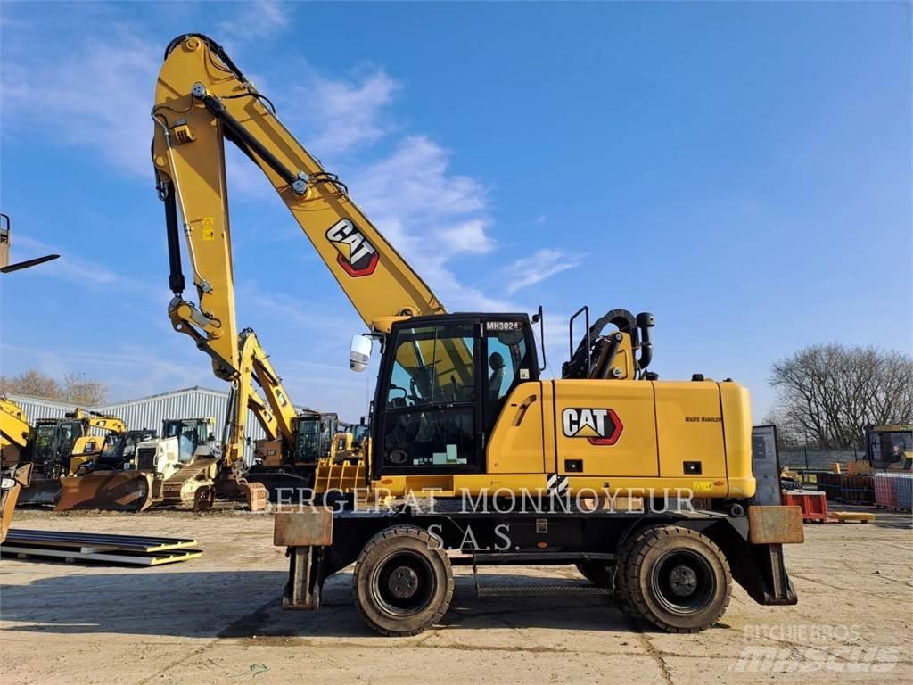 CAT MH3024 Ratiniai ekskavatoriai