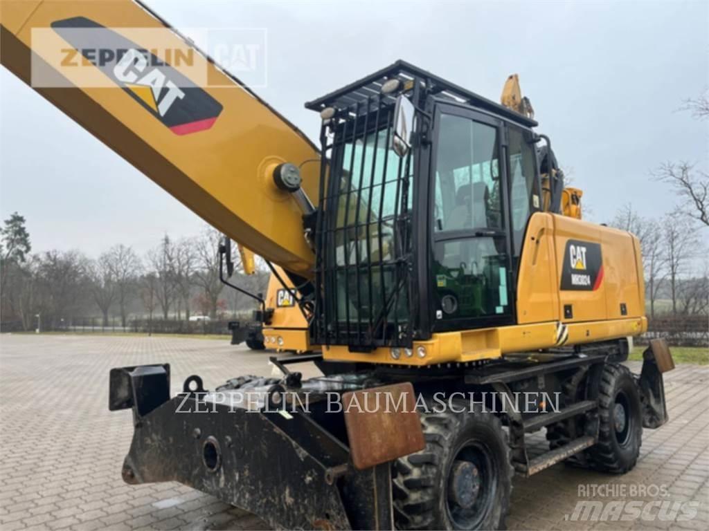 CAT MH3024 Griovimo ekskavatoriai