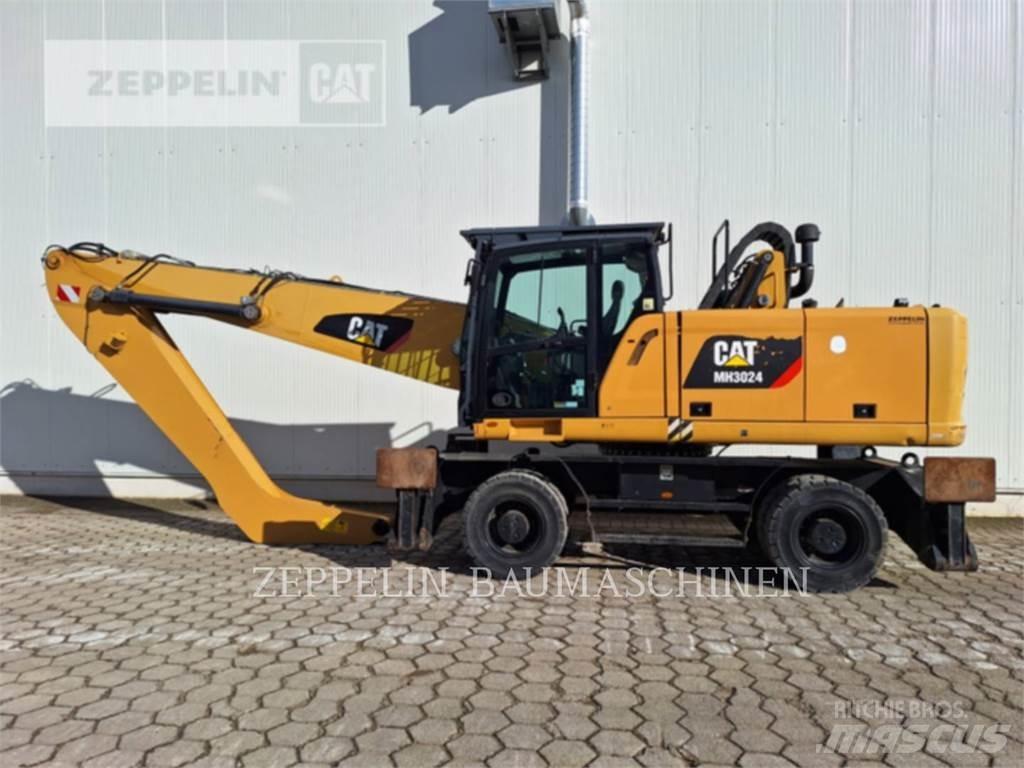 CAT MH3024 Griovimo ekskavatoriai