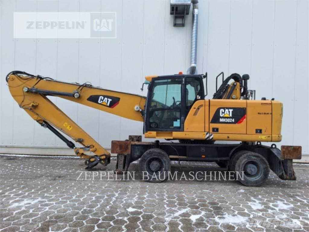 CAT MH3024-06C Griovimo ekskavatoriai