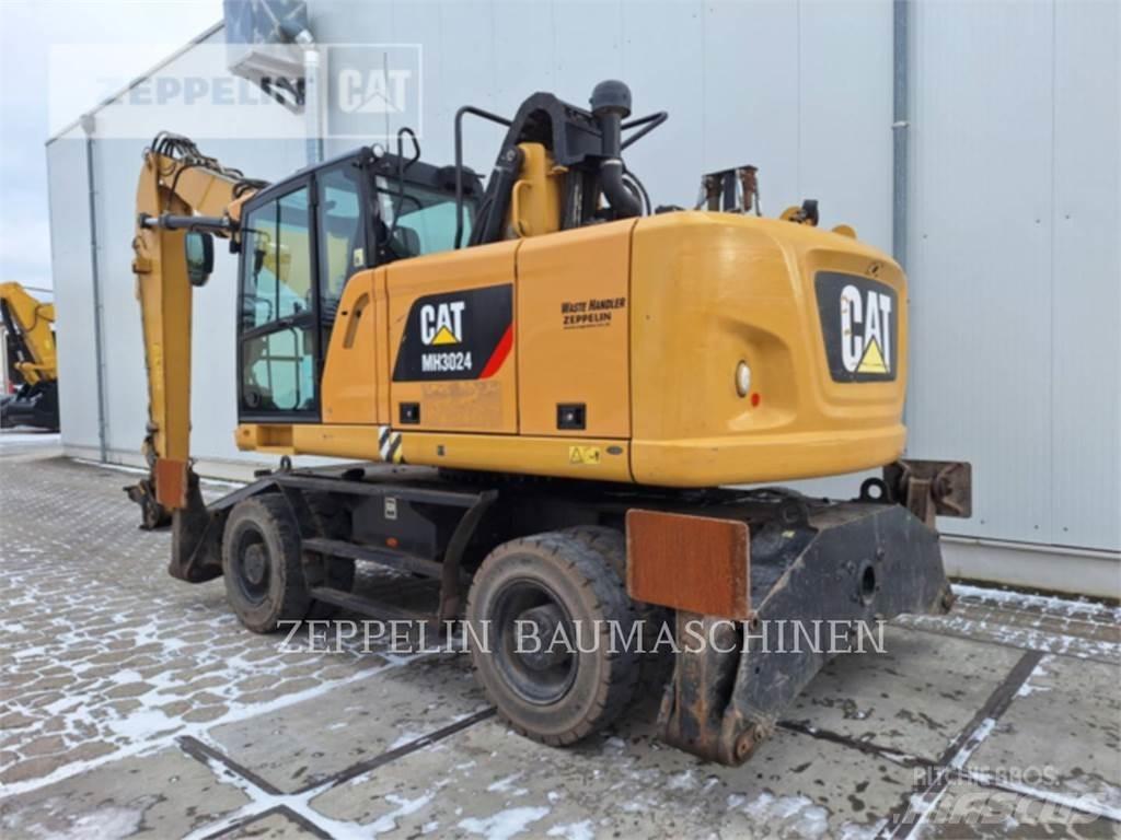 CAT MH3024-06C Griovimo ekskavatoriai