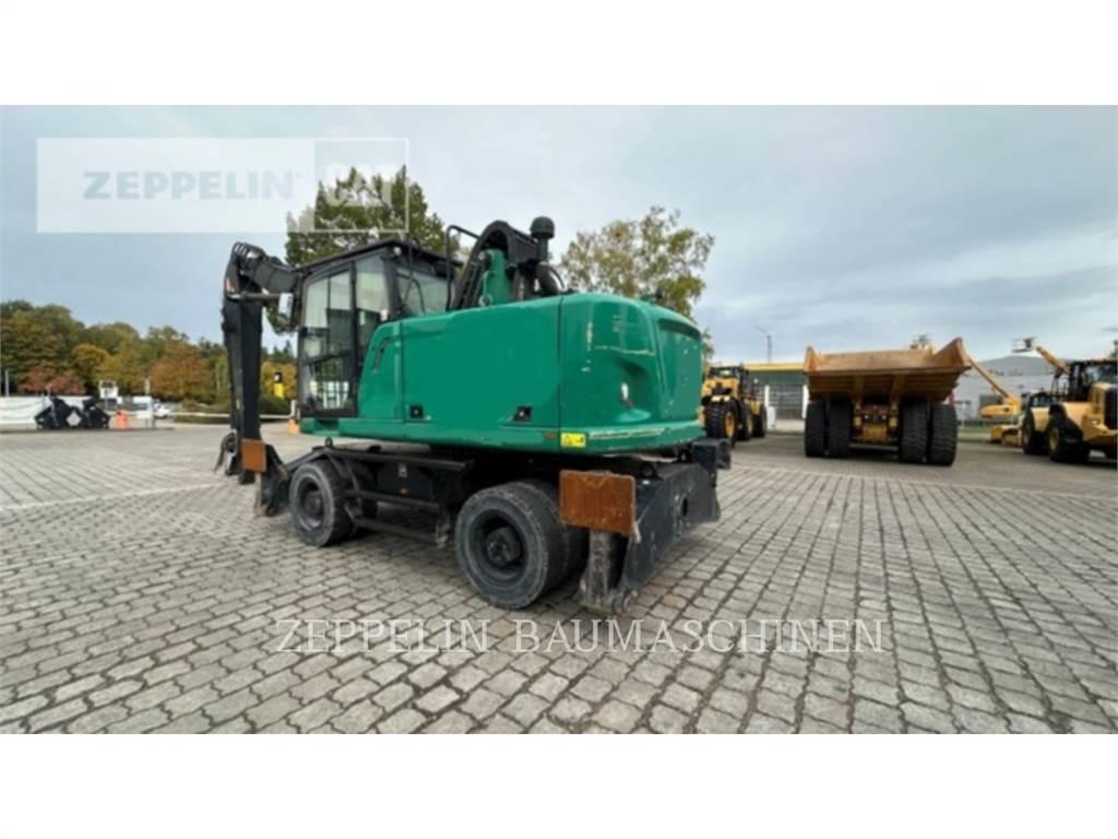 CAT MH3024-06C Griovimo ekskavatoriai