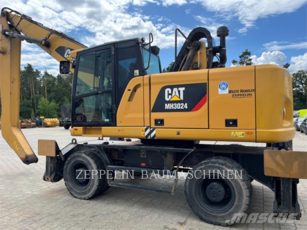 CAT MH3024-06C Griovimo ekskavatoriai