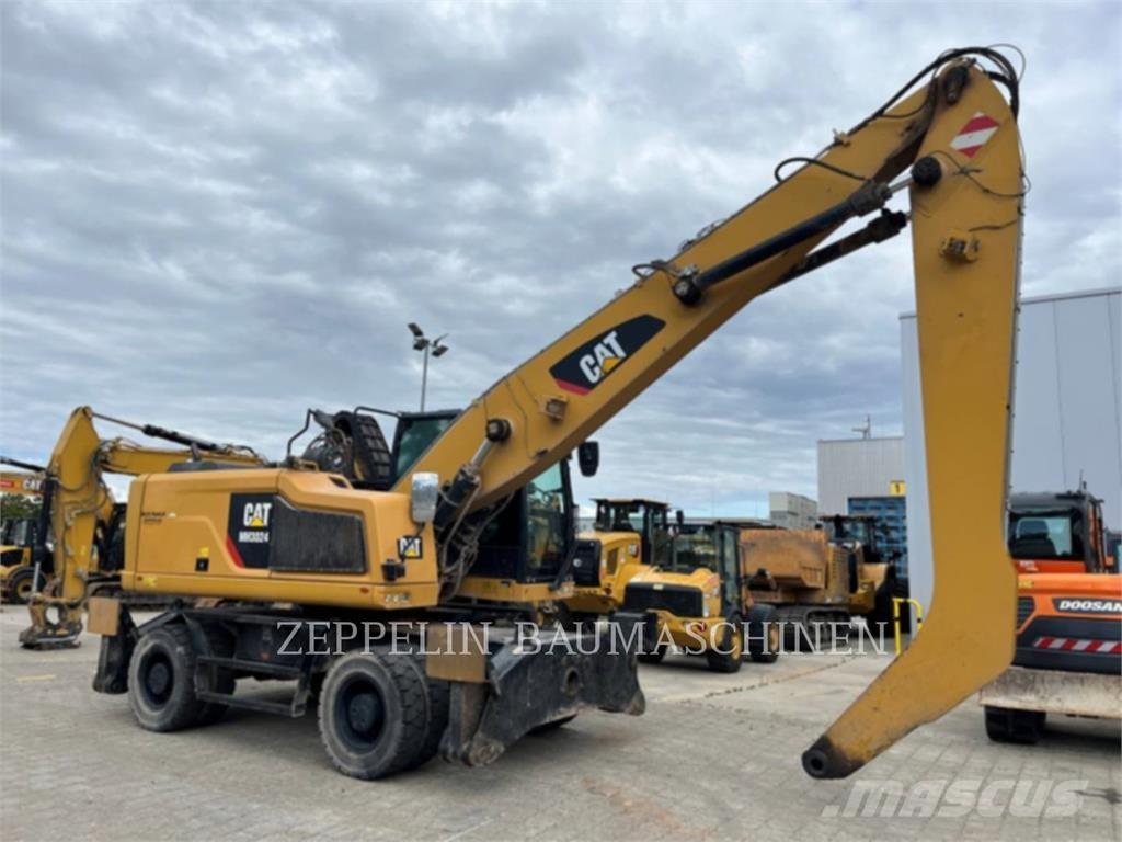 CAT MH3024-06C Griovimo ekskavatoriai