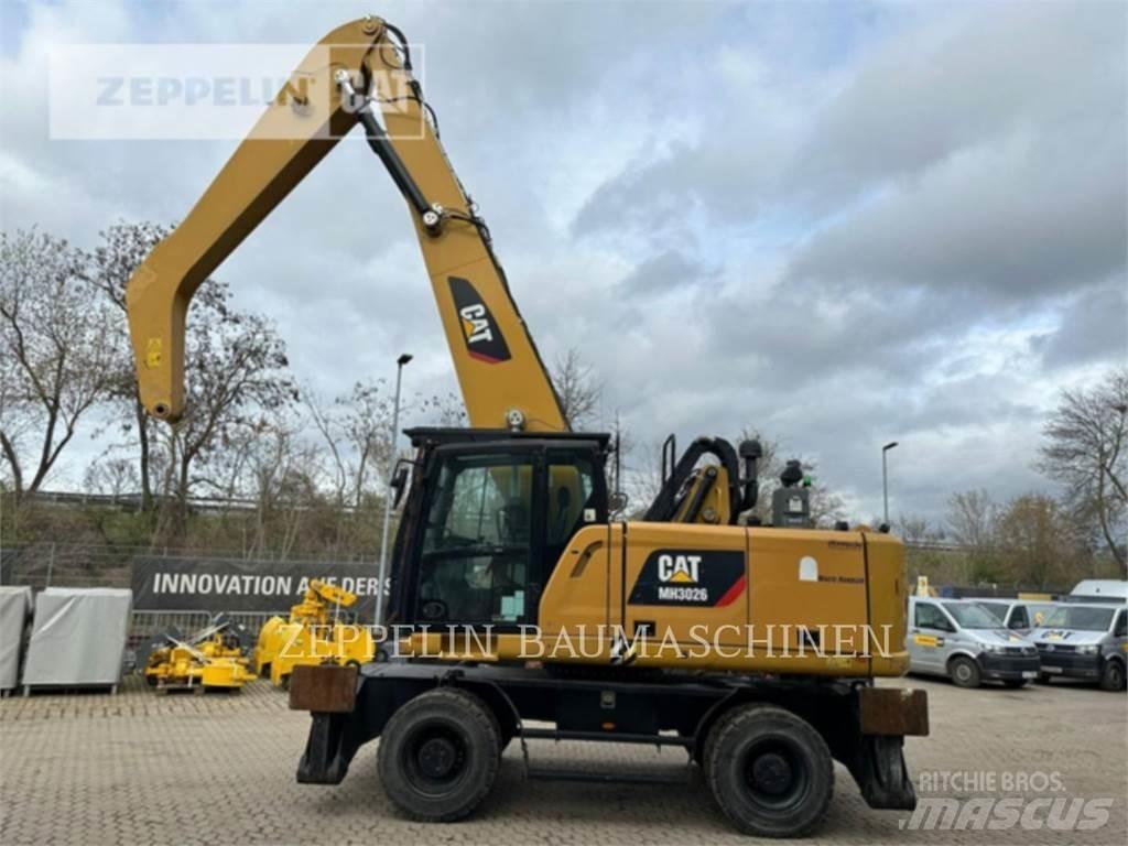 CAT MH3026-06C Griovimo ekskavatoriai