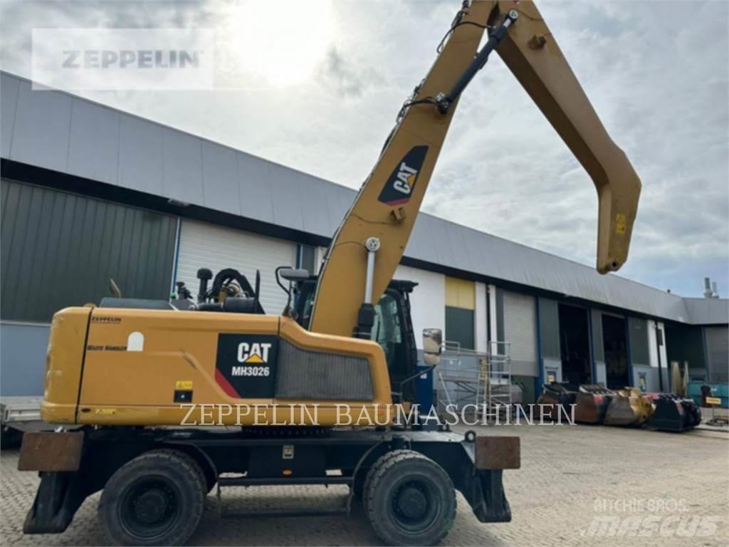 CAT MH3026-06C Griovimo ekskavatoriai