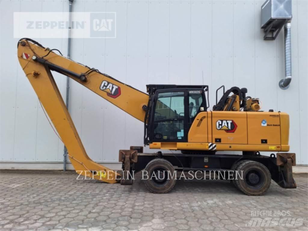 CAT MH3026-06C Griovimo ekskavatoriai