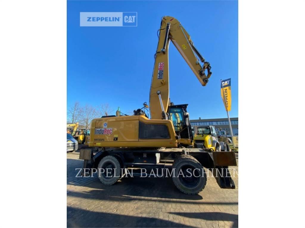 CAT MH3026-06C Griovimo ekskavatoriai