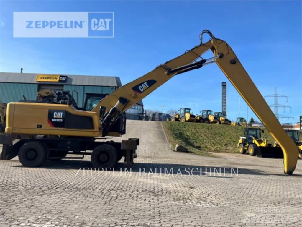 CAT MH3026-06C Griovimo ekskavatoriai