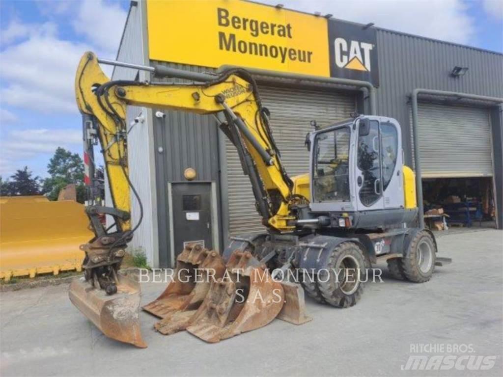 Neuson EW100 Ratiniai ekskavatoriai